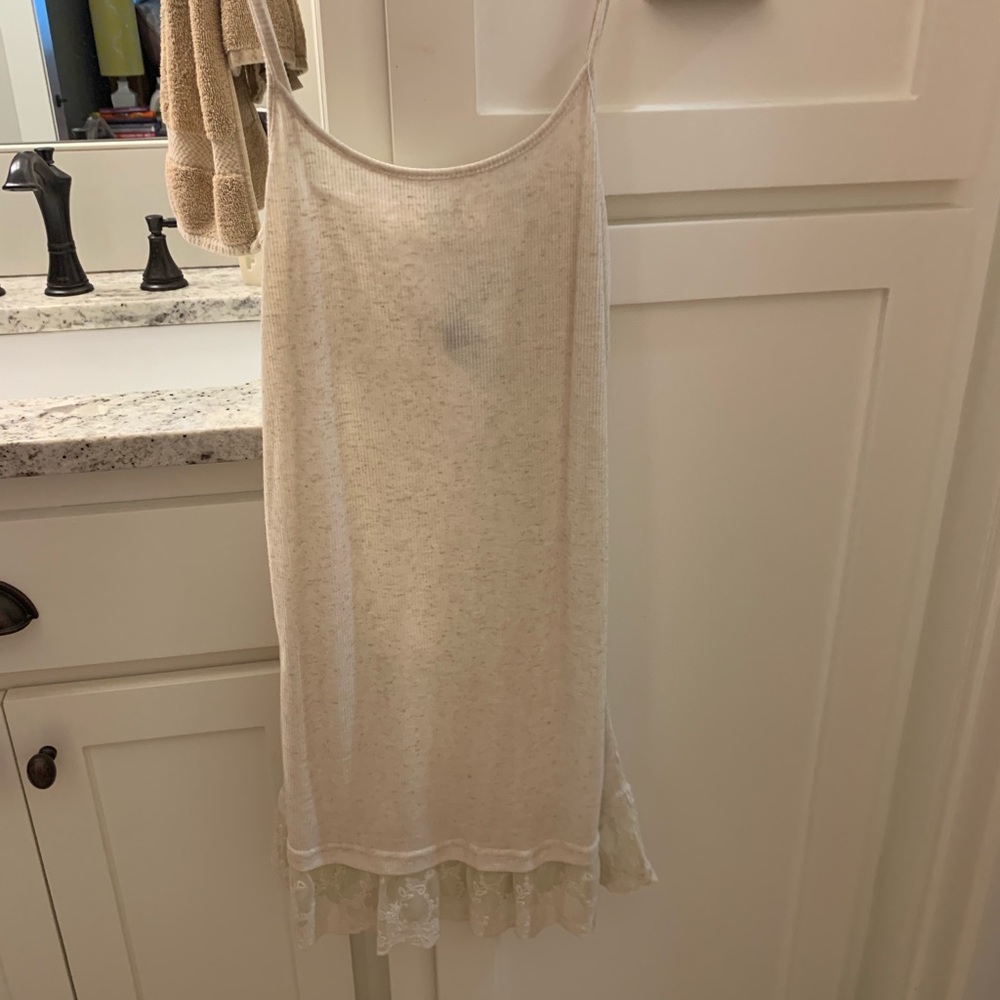 Woman’s dress extender with lace bottom